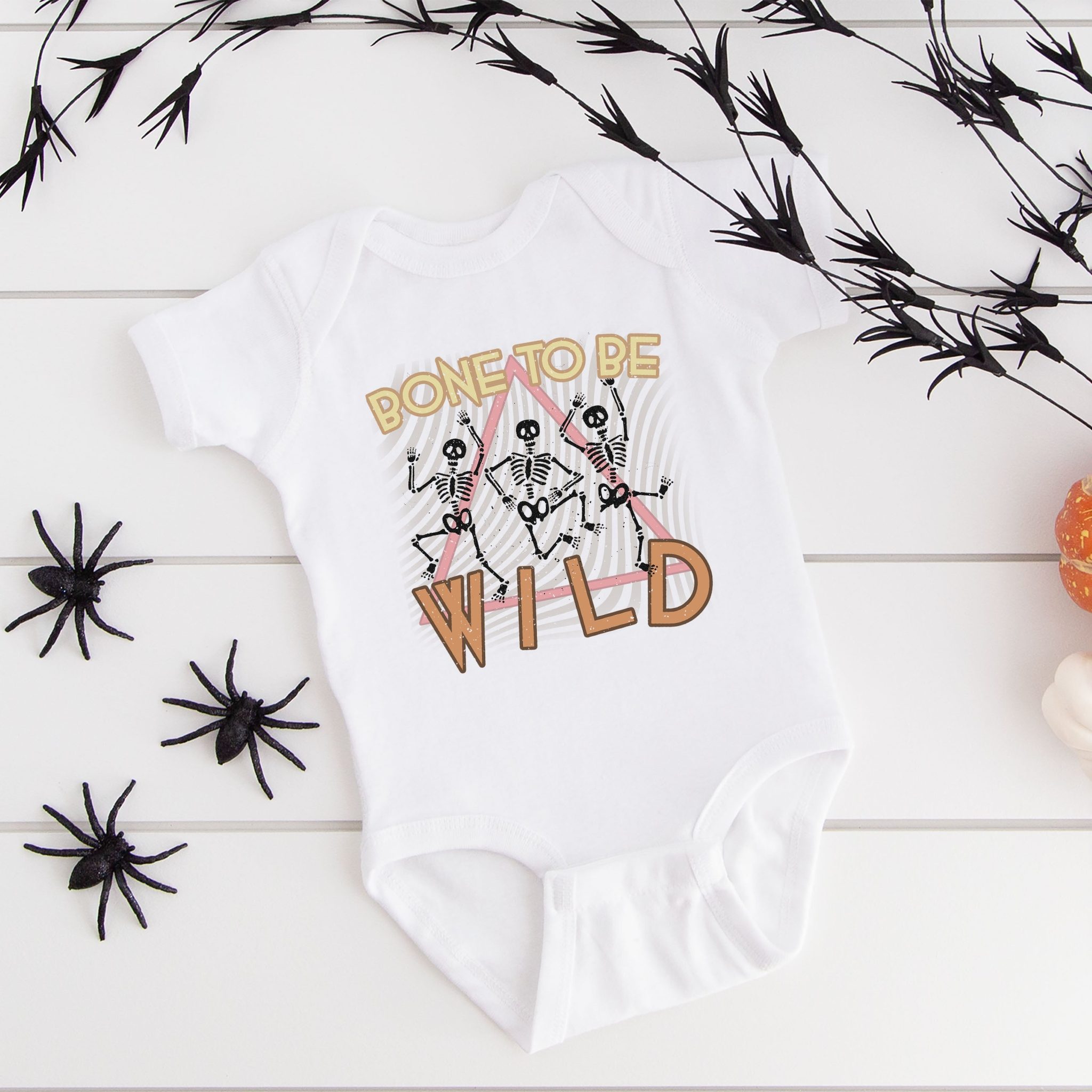 The Juniper Shop Baby Bone To Be Wild Graphic Short Sleeve Onesie